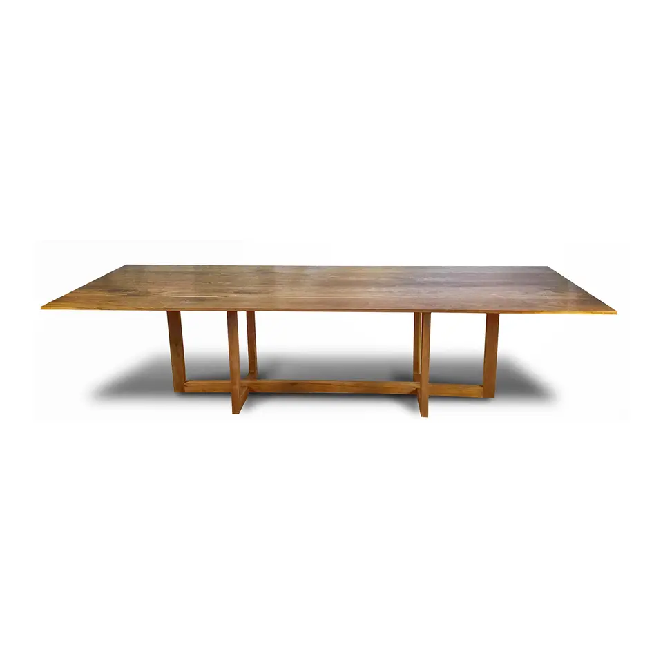 Andreen Dining Table in walnut with an interconnected solid-wood base